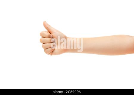 Pollice in alto. Mano dei bambini, palma gesturing isolato su sfondo bianco studio con copyspace per la vostra pubblicità. La mano della bambina con i segni. Infanzia, educazione, vendite, pubblicità, concetto di espressione. Foto Stock