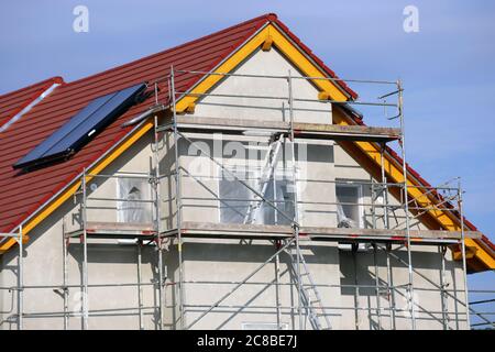 Nuova costruzione con intonaco di base finito Foto Stock