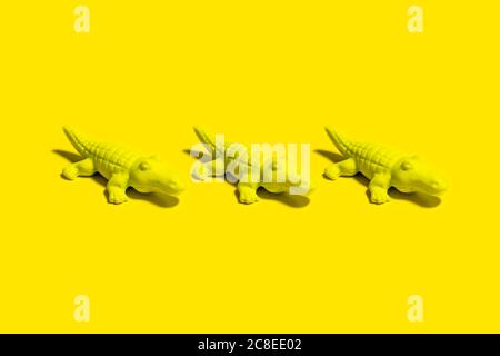 Studio di tre piccole statuette a coccodrillo Foto Stock