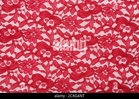 texure in pizzo rosso su bianco per uso su sfondo, full frame Foto Stock