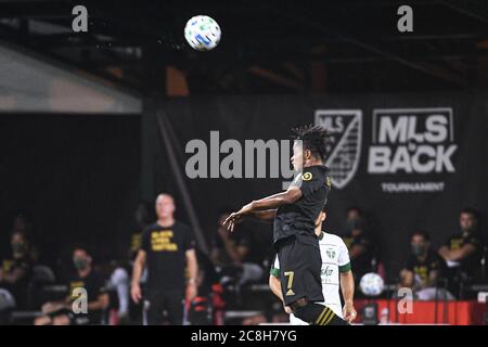 Orlando Florida USA . 23 luglio 2020. LAFC Midfielder Benedizione, Latif n° 7 fare un header durante il torneo MLS is Back all'ESPN Wild World of Sport di Orlando, Florida USA. Foto: Marty Jean-Louis Foto Stock