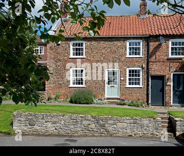 Case nel villaggio di Sheriff Hutton, North Yorkshire, Inghilterra Regno Unito Foto Stock