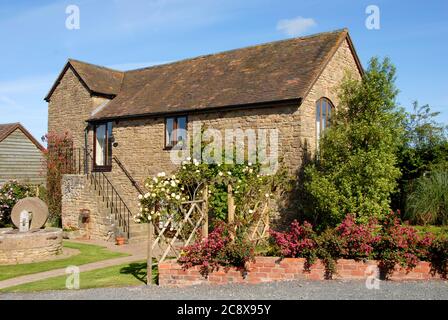 Attraente vecchio fienile convertito in alloggio per le vacanze, Herefordshire, Inghilterra Foto Stock