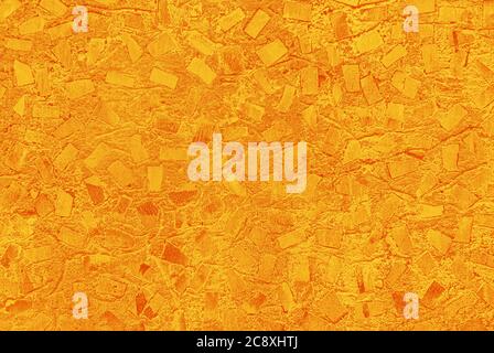 struttura astratta giallo-arancio di parete in cemento verniciata con motivo a mosaico casuale Foto Stock