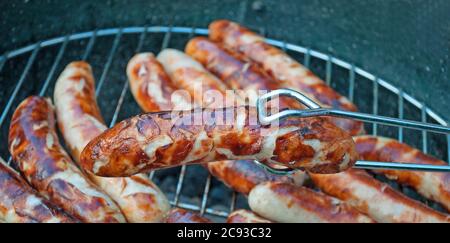 Salsicce alla griglia Foto Stock