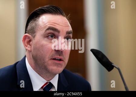 Adam D. DeMarco, Major District of Columbia National Guard, testimonia durante l'audizione della House Natural Resources Committee su "Domande senza risposta circa l'attacco della polizia del Parco degli Stati Uniti 1 giugno ai manifestanti pacifici a Lafayette Square" martedì 28 luglio 2020.Credit: Bill Clark/Pool via CNP | utilizzo in tutto il mondo Foto Stock