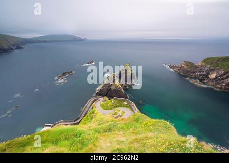 La vista mozzafiato delle isole Blasket dal molo di Dunquin (Dún Chaoin). Penisola di Dingle, Contea di Kerry, provincia di Munster, Irlanda, Europa. Foto Stock