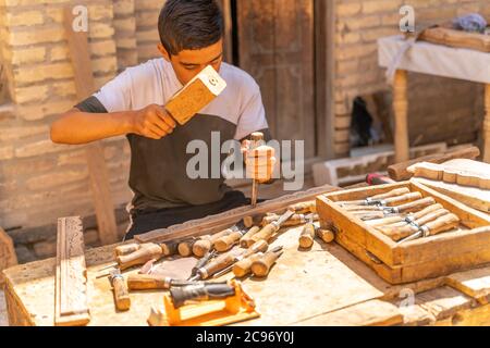 I giovani maestri del legno al lavoro Foto Stock