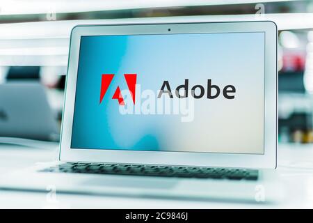 POZNAN, POL - 16 GIU 2020: Computer portatile con logo di Adobe Inc., una multinazionale americana di software per computer con sede a San Jo Foto Stock