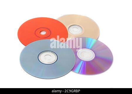 Diversi CD multicolore su sfondo bianco Foto Stock