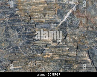 Beige marrone grigio lucido Tuff (roccia fatta di cenere vulcanica) texture - pietra naturale astratta texture sfondo Foto Stock