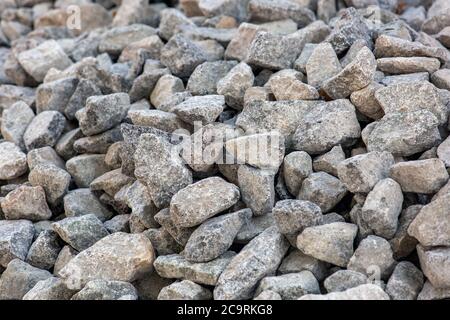 pietra frantumata, consistenza di una pietra di colore grigio. Foto Stock