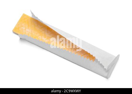 Bastoncino giallo di gomma in legatore di carta isolato su bianco. Foto Stock