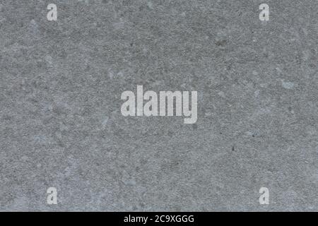 Fondo in pietra sintetica di colore grigio metallico. Foto Stock