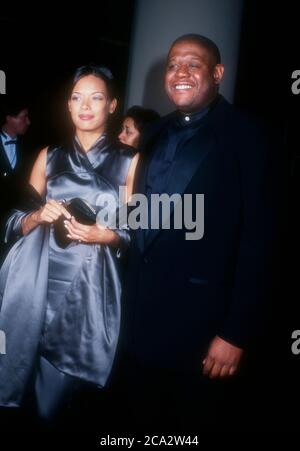 Beverly Hills, California, USA 29 Febbraio 1996 Actor Forest Whitaker e Keisha Whitaker partecipano al 24° Annual American Film Institute Lifetime Achievement Awards in onore di Clint Eastwood il 29 Febbraio 1996 al Beverly Hilton Hotel di Beverly Hills, California, USA. Foto di Barry King/Alamy Stock foto Foto Stock