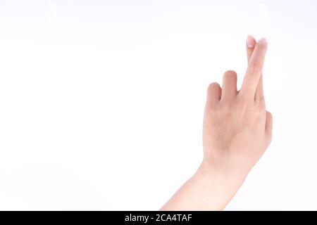 Simboli delle mani del dito concetto isolato Croce e mentire concettuali su sfondo bianco Foto Stock