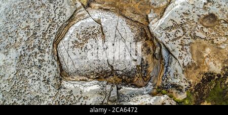 Vista delle rocce costiere, Tromboliti, Terranova Occidentale Foto Stock