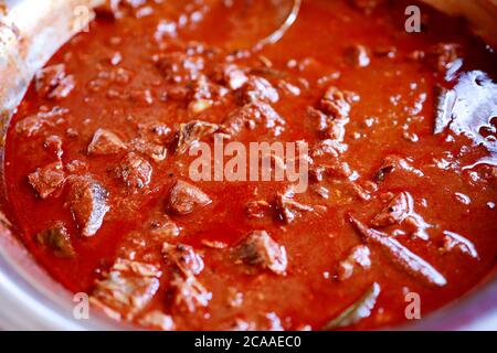 Ricetta piccante e gustosa di curry di pesce indiano. Foto Stock