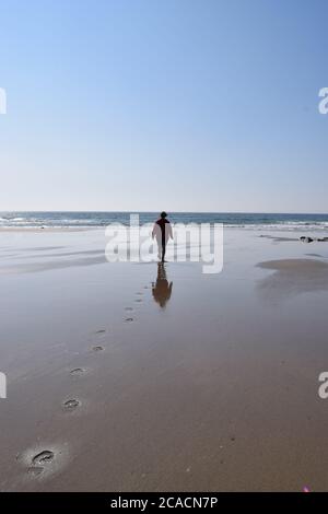 figura sulla spiaggia Foto Stock