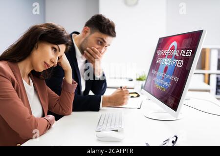 Ransomware Cyber Attack con malware. Violazione della sicurezza Foto Stock