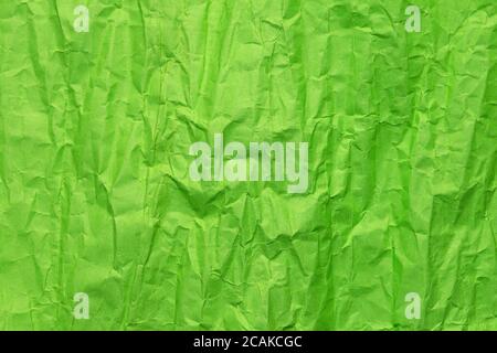 Grana carta verde piegata a grana fine, sfondo grunge Foto Stock