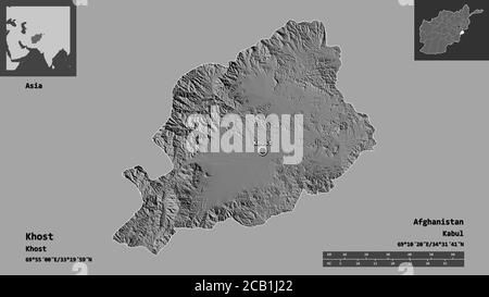 Forma di Khost, provincia dell'Afghanistan, e la sua capitale. Scala della distanza, anteprime ed etichette. Mappa elevazione bilivello. Rendering 3D Foto Stock