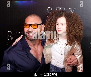 LAS VEGAS - Apr 2: Dave Bautista, Chloe Coleman al CinemaCon 2019 - STX film al Caesars Palace il 2 aprile 2019 a Las Vegas, NV Foto Stock