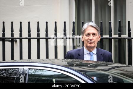 Philip Hammond, deputato politico del Partito conservatore britannico, Cancelliere dello scacchiere, lascia il n. 10 Downing Street, Londra Foto Stock