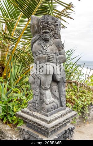 Statua nel tempio di Bolong a Bali, Indonesia Foto Stock