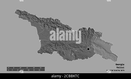 Forma desaturata della Georgia con la sua capitale, la principale divisione regionale e l'area separata di Kakheti. Etichette. Mappa elevazione bilivello. Rendering 3D Foto Stock