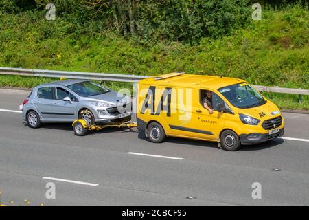 2019 Ford Transit Custom 340 base; Auto di soccorso rimorchio Auto AA moto; Regno Unito traffico veicolare, trasporto su strada, veicoli moderni, berlina, Guida di veicoli, strade e motori, in direzione sud sull'autostrada M6 Foto Stock