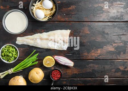 Pesce biologico e patatine ingredienti filetto di pesce bianco pastella di birra, potatoe, salsa tartaro, piselli minati, limone, scalogno, menta, aglio, sale Foto Stock