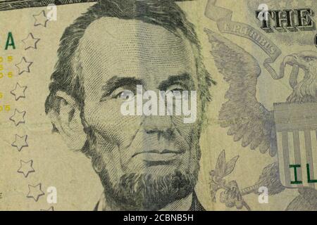 Foto macro del presidente Lincoln su banconota da 5 dollari Foto Stock