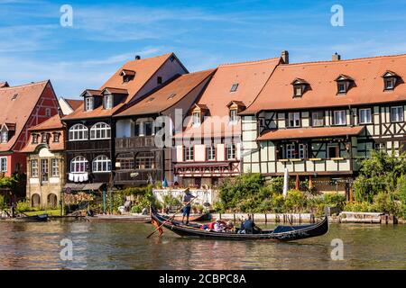 Gondola veneziana a Little Venice, gondolieri, ex case dei pescatori, Regnitz, città vecchia, Bamberga, Franconia, Baviera, Germania Foto Stock