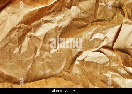 Trama dello sfondo carta da imballaggio piegata in punti diversi. Foto Stock