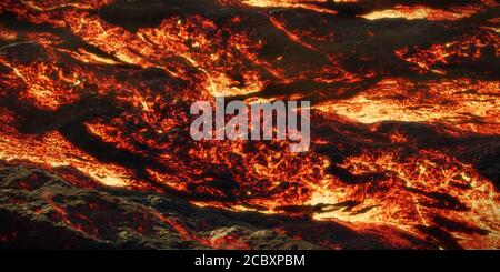 flusso di lava, flusso di magma ardente, paesaggio roccioso fuso Foto Stock