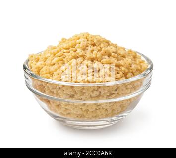 Ciotola di vetro di pasta di stelline non cotta, isolata su bianco Foto Stock