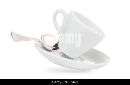 tazza di caffè in porcellana su piattino con cucchiaio isolato su bianco Foto Stock