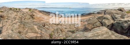 Vista di un campeggio sull'isola di Shark. Le barche sono visibili Foto Stock