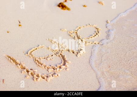 L'iscrizione sulla costa, la parola amore Foto Stock