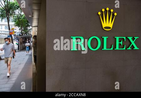 Swiss Luxury watchmaker Rolex logo visto a Hong Kong. Foto Stock