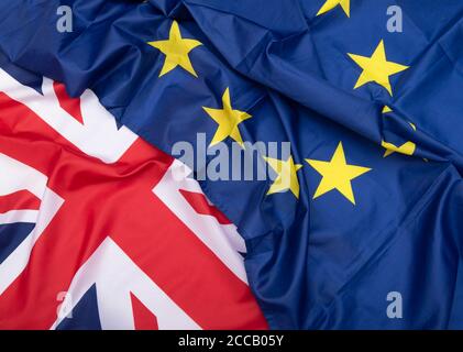 Brexit, bandiere di tessuto del Regno Unito e dell’Unione europea, quadro concettuale Foto Stock