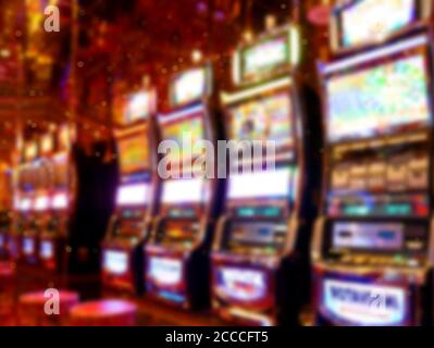 Immagine di una slot machine con sfocatura astratta. Casinò per uso in background Foto Stock