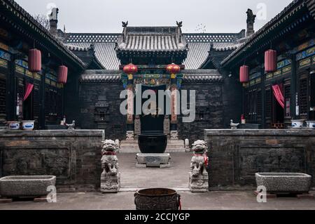 Cortile in famiglia ma a casa una dinastia Qing edificio tradizionale. Di Pingyao, nella provincia di Shanxi, Cina Foto Stock