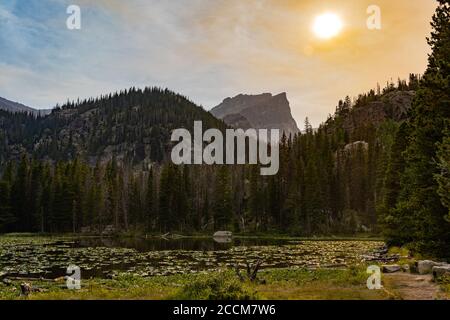 Ninfa lago Colorado incendi selvaggi cenere nel cielo Foto Stock