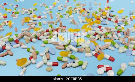 Molte compresse di colore diverso, capsule su sfondo blu. Concetto di assistenza sanitaria. Antibiotici all'interno di pillole, vitamine. Merci dalla farmacia Foto Stock