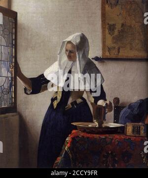 Johannes Vermeer - giovane donna con una caraffa d'acqua Foto Stock