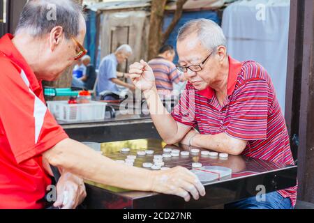 Xiangqi suonato a Singapore Foto Stock