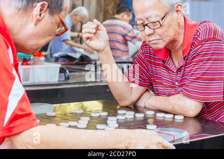 Xiangqi suonato a Singapore Foto Stock