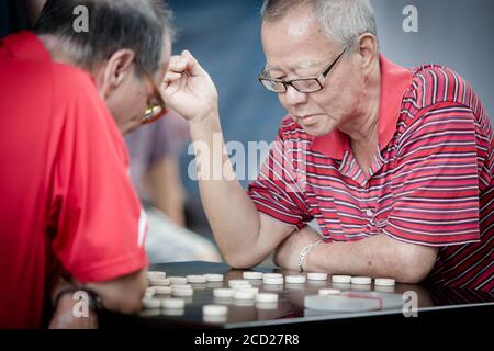 Xiangqi suonato a Singapore Foto Stock